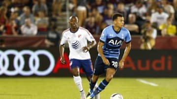 Jul 29, 2015; Denver, CO, USA; Tottenham Hotspur midfielder Dele Alli (20) and MLS All Stars midfielder Fabian Castillo (11) of FC Dallas chase the ball during the second half of the 2015 MLS All Star Game at Dick's Sporting Goods Park. Mandatory Credit: Isaiah J. Downing-USA TODAY Sports