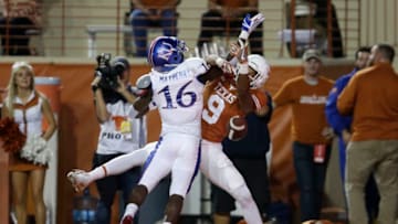 AUSTIN, TX - NOVEMBER 11: Kyle Mayberry #16 of the Kansas Jayhawks breaks up a pass in the endzone intended for Collin Johnson #9 of the Texas Longhorns in the second quarter at Darrell K Royal-Texas Memorial Stadium on November 11, 2017 in Austin, Texas. (Photo by Tim Warner/Getty Images)