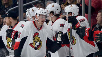 Jan 16, 2016; Los Angeles, CA, USA; Ottawa Senators defenseman Patrick Wiercioch (46) is greeted at the bench after a goal in the second period of the game against the Los Angeles Kings at Staples Center. Senators won 5-3. Mandatory Credit: Jayne Kamin-Oncea-USA TODAY Sports