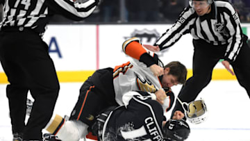 LOS ANGELES, CA - JANUARY 13: Anaheim Ducks Left Wing Nick Ritchie (37) fights with Los Angeles Kings Left Wing Kyle Clifford (13) and shoves him to the ice during an NHL game between the Anaheim Ducks and the Los Angeles Kings on January 13, 2018 at STAPLES Center in Los Angeles, CA. (Photo by Chris Williams/Icon Sportswire via Getty Images)