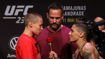 RIO DE JANEIRO, BRAZIL - MAY 10: Opponents Rose Namajunas (L) of the United States is presented a rose from Jessica Andrade of Brazil as they face off during the UFC 237 weigh-in at Jeunesse Arena on May 10, 2019 in Rio de Janeiro, Brazil. (Photo by Buda Mendes/Zuffa LLC/Zuffa LLC via Getty Images)
