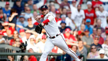 ATLANTA, GEORGIA - OCTOBER 03: Josh Donaldson #20 of the Atlanta Braves throws out the runner against the St. Louis Cardinals during the fourth inning in game one of the National League Division Series at SunTrust Park on October 03, 2019 in Atlanta, Georgia. (Photo by Todd Kirkland/Getty Images)