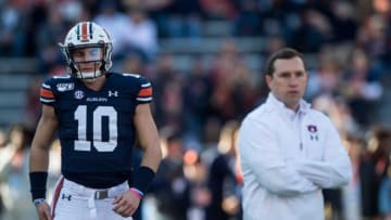 Auburn football quarterback Bo Nix (10) and Auburn offensive coordinator Kenny Dillingham during warm ups at Jordan-Hare Stadium in Auburn, Ala., on Saturday, Nov. 16, 2019.Jc Auburngeorgia 21