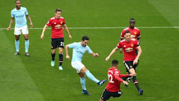 MANCHESTER, ENGLAND - APRIL 07: Ilkay Gundogan of Manchester City scores his sides second goal during the Premier League match between Manchester City and Manchester United at Etihad Stadium on April 7, 2018 in Manchester, England. (Photo by Manchester City FC/Man City via Getty Images)