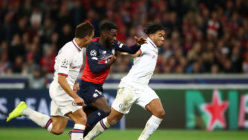 LILLE, FRANCE - OCTOBER 02: Jonathan Bamba of Lille is tackled by Cesar Azpilicueta and Reece James of Chelsea during the UEFA Champions League group H match between Lille OSC and Chelsea FC at Stade Pierre Mauroy on October 02, 2019 in Lille, France. (Photo by Bryn Lennon/Getty Images)