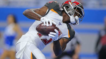 DETROIT, MI - DECEMBER 15: Breshad Perriman #19 of the Tampa Bay Buccaneers scores a first quarter touchdown during the game against the Detroit Lions at Ford Field on December 15, 2019 in Detroit, Michigan. (Photo by Leon Halip/Getty Images)
