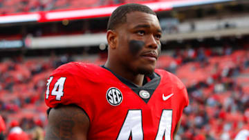 ATHENS, GA - NOVEMBER 06: Travon Walker #44 of the Georgia Bulldogs leaves the field at the conclusion of the game against the Missouri Tigers at Sanford Stadium on November 6, 2021 in Athens, Georgia. (Photo by Todd Kirkland/Getty Images)