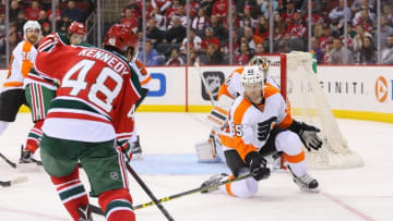 Feb 16, 2016; Newark, NJ, USA; Philadelphia Flyers defenseman Nick Schultz (55) drops down to block a shot attempt by New Jersey Devils center Tyler Kennedy (48) during the third period at Prudential Center. The Flyers defeated the Devils 6-3. Mandatory Credit: Ed Mulholland-USA TODAY Sports