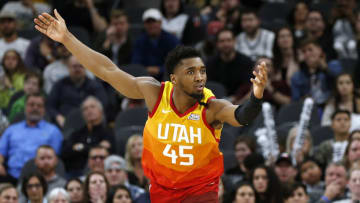 SAN ANTONIO, TX - JANUARY 29: Donovan Mitchell #45 of the Utah Jazz looks for a foul during second half action at AT&T Center on January 29, 2020 in San Antonio, Texas. San Antonio Spurs defeated the Utah Jazz 127-120. NOTE TO USER: User expressly acknowledges and agrees that , by downloading and or using this photograph, User is consenting to the terms and conditions of the Getty Images License Agreement. (Photo by Ronald Cortes/Getty Images)