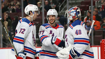 PHILADELPHIA, PA - MARCH 31: Filip Chytil #72, Tony DeAngelo #77, and Alexandar Georgiev #40 of the New York Rangers celebrate after defeating the Philadelphia Flyers 3-0 on March 31, 2019 at the Wells Fargo Center in Philadelphia, Pennsylvania. (Photo by Len Redkoles/NHLI via Getty Images)