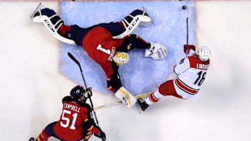 Apr 9, 2016; Sunrise, FL, USA; Carolina Hurricanes center Elias Lindholm (16) scores a goal past Florida Panthers goalie Roberto Luongo (1) and defenseman Brian Campbell (51) looks on at BB&T Center. The Panthers won 5-2. Mandatory Credit: Robert Mayer-USA TODAY Sports