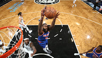 BROOKLYN, NY - OCTOBER 8: Kyle O'Quinn #9 of the New York Knicks grabs the rebound against the Brooklyn Nets during a preseason game on October 8, 2017 at Barclays Center in Brooklyn, New York. Copyright 2017 NBAE (Photo by Nathaniel S. Butler/NBAE via Getty Images)