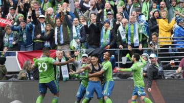 SEATTLE, WA - NOVEMBER 10: Raul Ruidiaz #9 of Seattle Sounders FC celebrates the third goal with his teammates during the match between Toronto FC and Seattle Sounders as part of the MLS Cup 2019 at CenturyLink Field on November 10, 2019 in Seattle, Washington. (Photo by Omar Vega/Getty Images)