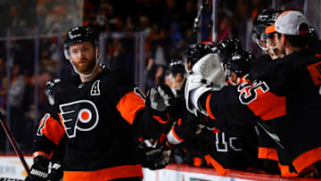 PHILADELPHIA, PENNSYLVANIA - NOVEMBER 02: Sean Couturier #14 of the Philadelphia Flyers celebrates after scoring during the third period against the Arizona Coyotes at Wells Fargo Center on November 02, 2021 in Philadelphia, Pennsylvania. (Photo by Tim Nwachukwu/Getty Images)