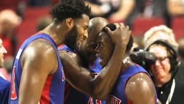 Nov 8, 2015; Portland, OR, USA; Detroit Pistons guard Reggie Jackson (1), right, celebrates with Pistons