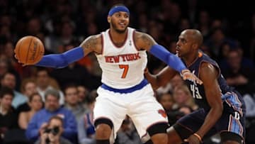 Jan 24, 2014; New York, NY, USA; Charlotte Bobcats power forward Anthony Tolliver (43) defends against New York Knicks small forward Carmelo Anthony (7) in the first half at Madison Square Garden. Mandatory Credit: Noah K. Murray-USA TODAY Sports