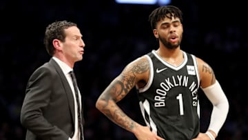 NEW YORK, NY - FEBRUARY 10: Kenny Atkinson of the Brooklyn Nets has a conversation with D'Angelo Russell