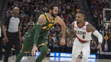 SALT LAKE CITY, UT - DECEMBER 25: Ricky Rubio #3 of the Utah Jazz drives past Damian Lillard #0 of the Portland Trail Blazers during their game at the Vivint Smart Home Arena on December 25, 2018 in Salt Lake City , Utah. (Photo by Chris Gardner/Getty Images)
