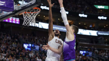 Jan 10, 2023; Salt Lake City, Utah, USA; Cleveland Cavaliers forward Evan Mobley (4) blocks the shot of Utah Jazz center Walker Kessler (24) during the fourth quarter at Vivint Arena. Mandatory Credit: Chris Nicoll-USA TODAY Sports