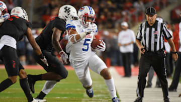 HOUSTON, TX - OCTOBER 24: Southern Methodist Mustangs running back Xavier Jones (5) fights to stay in bounds during the football game between the SMU Mustangs and Houston Cougars at TDECU Stadium on October 24, 2019 in Houston, TX. (Photo by Ken Murray/Icon Sportswire via Getty Images)