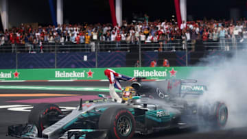 MEXICO CITY, MEXICO - OCTOBER 29: Lewis Hamilton of Great Britain and Mercedes GP celebrates after winning his fourth F1 World Drivers Championship after the Formula One Grand Prix of Mexico at Autodromo Hermanos Rodriguez on October 29, 2017 in Mexico City, Mexico. (Photo by Clive Mason/Getty Images)
