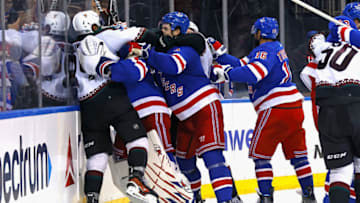 NEW YORK, NEW YORK - OCTOBER 16: Igor Shesterkin #31 of the New York Rangers wrestles with Matt Dumba #24 of the Arizona Coyotes at the end of the game at Madison Square Garden on October 16, 2023 in New York City. The Rangers defeated the Coyotes 2-1. (Photo by Bruce Bennett/Getty Images)