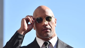 HOLLYWOOD, CA - DECEMBER 13: Actor Dwayne Johnson attends a ceremony honoring him with the 2,624th star on the Hollywood Walk of Fame on December 13, 2017 in Hollywood, California. (Photo by Alberto E. Rodriguez/Getty Images)