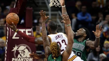 Mar 5, 2016; Cleveland, OH, USA; Cleveland Cavaliers forward LeBron James (23) is defended by Boston Celtics forward Jae Crowder (99) during the third quarter at Quicken Loans Arena. The Cavs won 120-103. Mandatory Credit: Ken Blaze-USA TODAY Sports