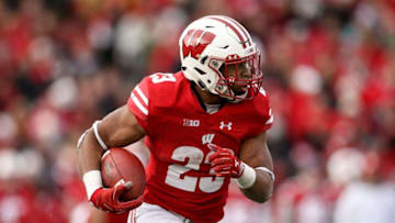 MADISON, WISCONSIN - NOVEMBER 03: Jonathan Taylor #23 of the Wisconsin Badgers runs with the ball in the third quarter against the Rutgers Scarlet Knights at Camp Randall Stadium on November 03, 2018 in Madison, Wisconsin. (Photo by Dylan Buell/Getty Images)