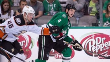 Oct 27, 2015; Dallas, TX, USA; Anaheim Ducks left wing Jiri Sekac (46) and Dallas Stars left wing Jamie Benn (14) chase the puck during the game at the American Airlines Center. The Stars defeat the Ducks 4-3. Mandatory Credit: Jerome Miron-USA TODAY Sports