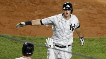 NEW YORK, NEW YORK - SEPTEMBER 17: (NEW YORK DAILIES OUT) DJ LeMahieu #26 of the New York Yankees celebrates his fourth inning home run against the Toronto Blue Jays with teammate Luke Voit #59 at Yankee Stadium on September 17, 2020 in New York City. The Yankees defeated the Blue Jays 10-7. (Photo by Jim McIsaac/Getty Images)