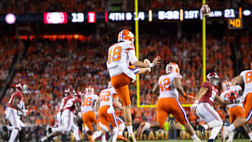 SANTA CLARA, CA - JANUARY 07: Will Spiers #48 of the Clemson Tigers punts against the Alabama Crimson Tide during the College Football Playoff National Championship held at Levi's Stadium on January 7, 2019 in Santa Clara, California. The Clemson Tigers defeated the Alabama Crimson Tide 44-16. (Photo by Jamie Schwaberow/Getty Images)