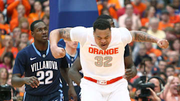SYRACUSE, NY - JANUARY 12: DaJuan Coleman #32 of the Syracuse Orange reacts after a play during their win over the Villanova Wildcats during the game at the Carrier Dome on January 12, 2013 in Syracuse, New York. (Photo by Nate Shron/Getty Images)