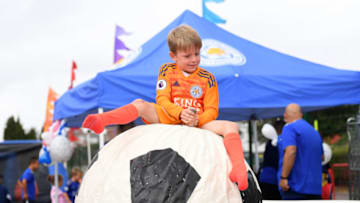 LEICESTER, ENGLAND - SEPTEMBER 29: A young fan enjoys pre-match atmosphere outside the stadium prior to the Premier League match between Leicester City and Newcastle United at The King Power Stadium on September 29, 2019 in Leicester, United Kingdom. (Photo by Michael Regan/Getty Images)