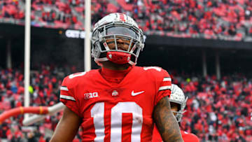 COLUMBUS, OHIO - NOVEMBER 12: Xavier Johnson #10 of the Ohio State Buckeyes reacts after scoring a touchdown during the fourth quarter of a game against the Indiana Hoosiers at Ohio Stadium on November 12, 2022 in Columbus, Ohio. (Photo by Ben Jackson/Getty Images)4
