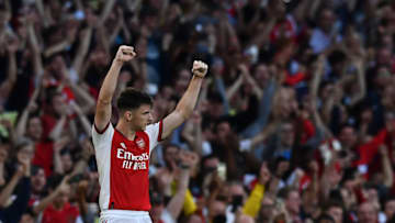 Arsenal's Scottish defender Kieran Tierney celebrates their win in the English Premier League football match between Arsenal and Tottenham Hotspur at the Emirates Stadium in London on September 26, 2021. - Arsenal won the game 3-1. - RESTRICTED TO EDITORIAL USE. No use with unauthorized audio, video, data, fixture lists, club/league logos or 'live' services. Online in-match use limited to 120 images. An additional 40 images may be used in extra time. No video emulation. Social media in-match use limited to 120 images. An additional 40 images may be used in extra time. No use in betting publications, games or single club/league/player publications. (Photo by Ben STANSALL / AFP) / RESTRICTED TO EDITORIAL USE. No use with unauthorized audio, video, data, fixture lists, club/league logos or 'live' services. Online in-match use limited to 120 images. An additional 40 images may be used in extra time. No video emulation. Social media in-match use limited to 120 images. An additional 40 images may be used in extra time. No use in betting publications, games or single club/league/player publications. / RESTRICTED TO EDITORIAL USE. No use with unauthorized audio, video, data, fixture lists, club/league logos or 'live' services. Online in-match use limited to 120 images. An additional 40 images may be used in extra time. No video emulation. Social media in-match use limited to 120 images. An additional 40 images may be used in extra time. No use in betting publications, games or single club/league/player publications. (Photo by BEN STANSALL/AFP via Getty Images)