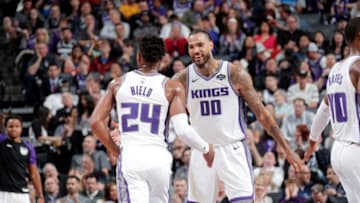 SACRAMENTO, CA - MARCH 21: Buddy Hield #24 and Willie Cauley-Stein #00 of the Sacramento Kings high five during the game against the Dallas Mavericks on March 21, 2019 at Golden 1 Center in Sacramento, California. NOTE TO USER: User expressly acknowledges and agrees that, by downloading and or using this Photograph, user is consenting to the terms and conditions of the Getty Images License Agreement. Mandatory Copyright Notice: Copyright 2019 NBAE (Photo by Rocky Widner/NBAE via Getty Images)