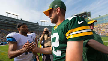 Sep 25, 2016; Green Bay, WI, USA; Green Bay Packers quarterback Aaron Rodgers (12) and Detroit Lions wide receiver Golden Tate (15) following the game at Lambeau Field. Green Bay won 34-27. Mandatory Credit: Jeff Hanisch-USA TODAY Sports