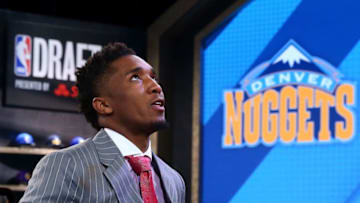 NEW YORK, NY - JUNE 22: Donovan Mitchell walks to stage after being drafted 13th overall by the Denver Nuggetsduring the first round of the 2017 NBA Draft at Barclays Center on June 22, 2017 in New York City. (Photo by Mike Stobe/Getty Images)