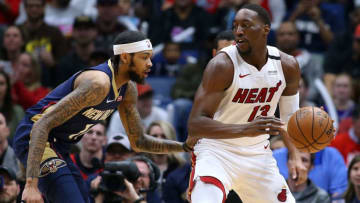 Bam Adebayo #13 of the Miami Heat drives against Brandon Ingram #14 of the New Orleans Pelicans. (Photo by Jonathan Bachman/Getty Images)