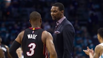 Apr 25, 2016; Charlotte, NC, USA; Miami Heat forward Chris Bosh (1) talks with guard Dwayne Wade (3) during a timeout in the second quarter against the Charlotte Hornets in game four of the first round of the NBA Playoffs at Time Warner Cable Arena. Mandatory Credit: Jeremy Brevard-USA TODAY Sports