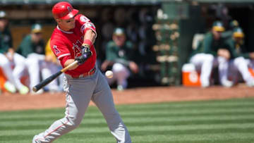 Apr 13, 2016; Oakland, CA, USA; Los Angeles Angels center fielder Mike Trout (27) singles to right field against the Oakland Athletics in the third inning at O.co Coliseum. Mandatory Credit: Neville E. Guard-USA TODAY Sports