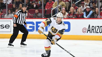 GLENDALE, AZ - DECEMBER 30: Brad Hunt #77 of the Vegas Golden Knights skates with the puck against the Arizona Coyotes at Gila River Arena on December 30, 2018 in Glendale, Arizona. (Photo by Norm Hall/NHLI via Getty Images)