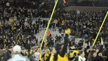 Nov 28, 2014; Columbia, MO, USA; Missouri Tigers fans and students storm the field and tear down the goalposts after the game against the Arkansas Razorbacks at Faurot Field. Missouri won 21-14. Mandatory Credit: Denny Medley-USA TODAY Sports