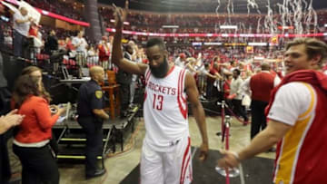 Apr 21, 2015; Houston, TX, USA; Houston Rockets guard James Harden (13) celebrates the win over the Dallas Mavericks in game two of the first round of the NBA Playoffs at Toyota Center. Rockets won 111 to 99. Mandatory Credit: Thomas B. Shea-USA TODAY Sports