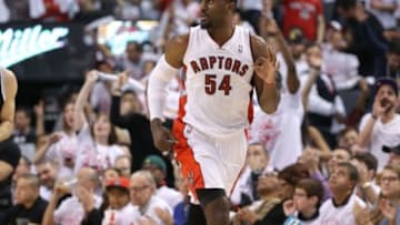 Apr 19, 2014; Toronto, Ontario, CAN; Toronto Raptors forward Patrick Patterson (54) reacts after hitting a three-pointer against the Brooklyn Nets in game one during the first round of the 2014 NBA Playoffs at Air Canada Centre. The Nets beat the Raptors 94-87. Mandatory Credit: Tom Szczerbowski-USA TODAY Sports
