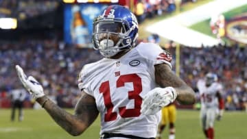 Nov 29, 2015; Landover, MD, USA; New York Giants wide receiver Odell Beckham (13) celebrates after scoring a touchdown against the Washington Redskins in the fourth quarter at FedEx Field. The Redskins won 20-14. Mandatory Credit: Geoff Burke-USA TODAY Sports