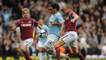LONDON, ENGLAND - MAY 09: Roque Santa Cruz of Man City battles with Matthew Upson of West Ham during the Barclays Premier League match between West Ham United and Manchester City at Boleyn Ground on May 9, 2010 in London, England. (Photo by Christopher Lee/Getty Images)