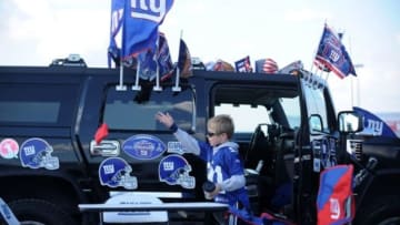 Nov 10, 2013; East Rutherford, NJ, USA; New York Giants fans tailgate before the game against the Oakland Raiders at MetLife Stadium. Mandatory Credit: Kirby Lee-USA TODAY Sports