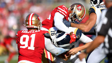 LOS ANGELES, CA - OCTOBER 13: Middle linebacker Kwon Alexander #56 and defensive end Arik Armstead #91 of the San Francisco 49ers sack quarterback Jared Goff #16 of the Los Angeles Rams in the second half at Los Angeles Memorial Coliseum on October 13, 2019 in Los Angeles, California. (Photo by Jayne Kamin-Oncea/Getty Images)